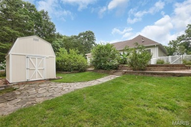 Welcome to resort-style living in this lovely custom ranch with on Raintree Country Club in Missouri - for sale on GolfHomes.com, golf home, golf lot
