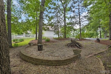 Welcome to resort-style living in this lovely custom ranch with on Raintree Country Club in Missouri - for sale on GolfHomes.com, golf home, golf lot