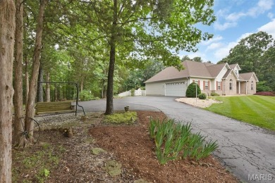 Welcome to resort-style living in this lovely custom ranch with on Raintree Country Club in Missouri - for sale on GolfHomes.com, golf home, golf lot