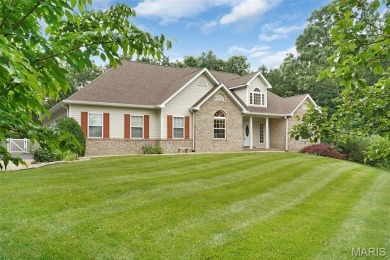 Welcome to resort-style living in this lovely custom ranch with on Raintree Country Club in Missouri - for sale on GolfHomes.com, golf home, golf lot