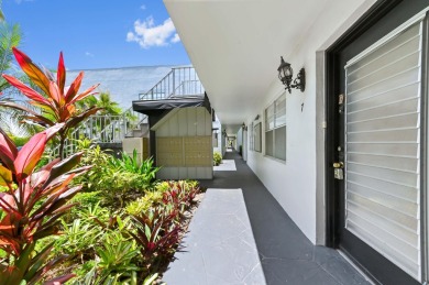Enjoy every day in this ground-floor golf & lakeview condo in on Kings Point Golf -Flanders Way in Florida - for sale on GolfHomes.com, golf home, golf lot