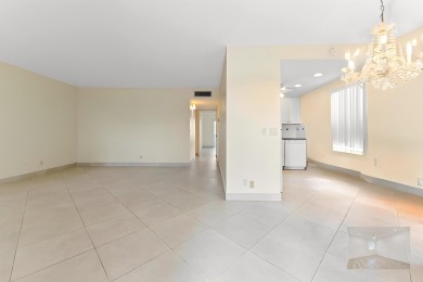 Enjoy every day in this ground-floor golf & lakeview condo in on Kings Point Golf -Flanders Way in Florida - for sale on GolfHomes.com, golf home, golf lot