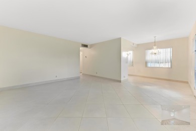 Enjoy every day in this ground-floor golf & lakeview condo in on Kings Point Golf -Flanders Way in Florida - for sale on GolfHomes.com, golf home, golf lot
