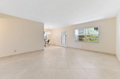 Enjoy every day in this ground-floor golf & lakeview condo in on Kings Point Golf -Flanders Way in Florida - for sale on GolfHomes.com, golf home, golf lot