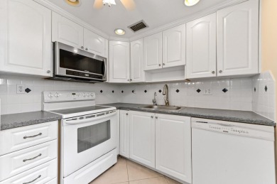 Enjoy every day in this ground-floor golf & lakeview condo in on Kings Point Golf -Flanders Way in Florida - for sale on GolfHomes.com, golf home, golf lot