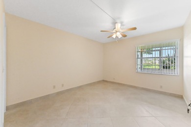 Enjoy every day in this ground-floor golf & lakeview condo in on Kings Point Golf -Flanders Way in Florida - for sale on GolfHomes.com, golf home, golf lot