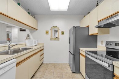 FIRST-FLOOR, END UNIT & furnished-turnkey! Features a fabulous on Vista Plantation Golf Club in Florida - for sale on GolfHomes.com, golf home, golf lot