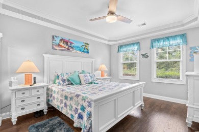 Enjoy low-maintenance resort living in this spacious 3-bedroom on Barefoot Resort and Golf Club  in South Carolina - for sale on GolfHomes.com, golf home, golf lot