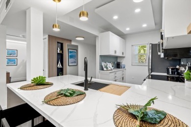 Experience luxury coastal living at its finest. This impeccably on Plantation Golf and Country Club in Florida - for sale on GolfHomes.com, golf home, golf lot