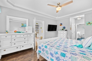 Enjoy low-maintenance resort living in this spacious 3-bedroom on Barefoot Resort and Golf Club  in South Carolina - for sale on GolfHomes.com, golf home, golf lot