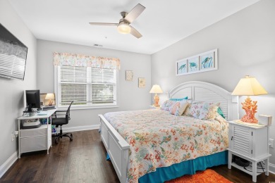 Enjoy low-maintenance resort living in this spacious 3-bedroom on Barefoot Resort and Golf Club  in South Carolina - for sale on GolfHomes.com, golf home, golf lot