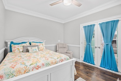 Enjoy low-maintenance resort living in this spacious 3-bedroom on Barefoot Resort and Golf Club  in South Carolina - for sale on GolfHomes.com, golf home, golf lot
