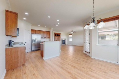 Step into this beautifully refreshed LaCosta model, where on Wildhorse Golf Club of Robson Ranch in Texas - for sale on GolfHomes.com, golf home, golf lot