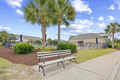 Enjoy low-maintenance resort living in this spacious 3-bedroom on Barefoot Resort and Golf Club  in South Carolina - for sale on GolfHomes.com, golf home, golf lot