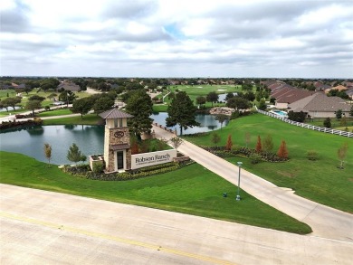 Step into this beautifully refreshed LaCosta model, where on Wildhorse Golf Club of Robson Ranch in Texas - for sale on GolfHomes.com, golf home, golf lot