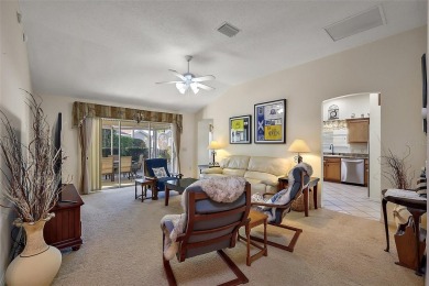 Nestled in the highly sought-after Village of Poinciana, this on The Links of Spruce Creek in Florida - for sale on GolfHomes.com, golf home, golf lot