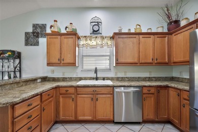 Nestled in the highly sought-after Village of Poinciana, this on The Links of Spruce Creek in Florida - for sale on GolfHomes.com, golf home, golf lot