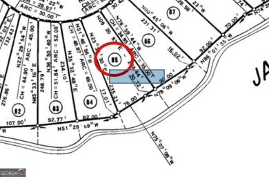 A rare waterfront deeded building lot in Turtle Cove with deep for sale on GolfHomes.com
