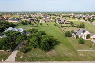 Gorgeous lot in popular Lake Ridge community. Just minutes to on Tangle Ridge Golf Club in Texas - for sale on GolfHomes.com, golf home, golf lot