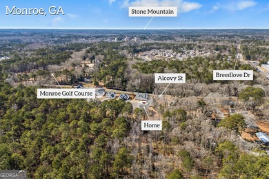 New construction farmhouse walking distance (or take your golf on Monroe Golf and Country Club in Georgia - for sale on GolfHomes.com, golf home, golf lot