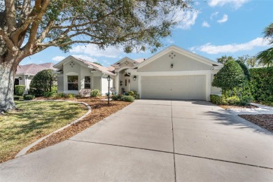 Welcome to this METICULOUSLY MAINTAINED LANTANA DESIGNER MODEL on The Links of Spruce Creek in Florida - for sale on GolfHomes.com, golf home, golf lot