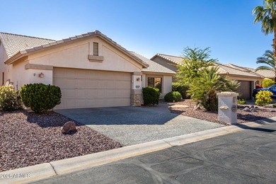Turn-key! This popular Augusta floorplan is tucked away in a on Tuscany Falls At Pebble Creek in Arizona - for sale on GolfHomes.com, golf home, golf lot