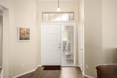 Turn-key! This popular Augusta floorplan is tucked away in a on Tuscany Falls At Pebble Creek in Arizona - for sale on GolfHomes.com, golf home, golf lot