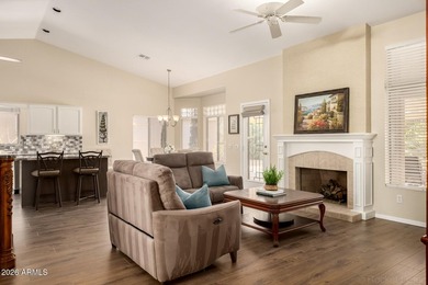 Turn-key! This popular Augusta floorplan is tucked away in a on Tuscany Falls At Pebble Creek in Arizona - for sale on GolfHomes.com, golf home, golf lot