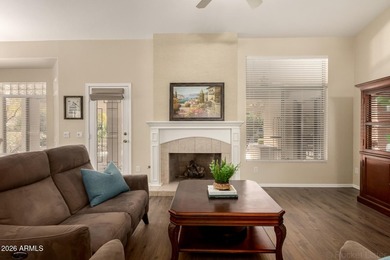 Turn-key! This popular Augusta floorplan is tucked away in a on Tuscany Falls At Pebble Creek in Arizona - for sale on GolfHomes.com, golf home, golf lot