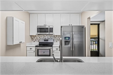 Enjoy serene lake and golf course views from this beautifully on Vista Plantation Golf Club in Florida - for sale on GolfHomes.com, golf home, golf lot