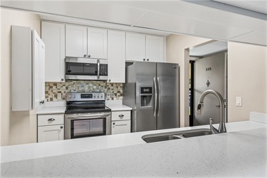 Enjoy serene lake and golf course views from this beautifully on Vista Plantation Golf Club in Florida - for sale on GolfHomes.com, golf home, golf lot