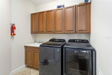 Live the resort lifestyle in this gorgeous 3-bedroom, 2-bath + on Venetian Golf and River Club in Florida - for sale on GolfHomes.com, golf home, golf lot