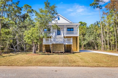 This beautiful new construction is a quick golf cart ride to all on Pass Christian Isles Golf Club in Mississippi - for sale on GolfHomes.com, golf home, golf lot