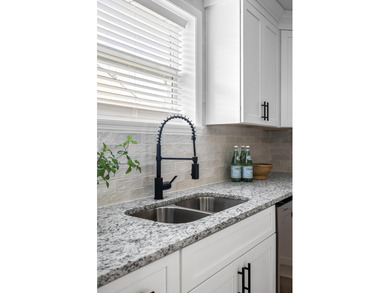 This beautifully renovated Augusta home blends modern comfort on Augusta Municipal Golf Course in Georgia - for sale on GolfHomes.com, golf home, golf lot