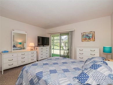 This turnkey 2 bedroom/2 bath condo has impact windows except on The American Golf Club in Florida - for sale on GolfHomes.com, golf home, golf lot