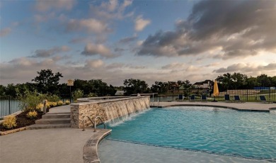 Fabulous two-story home located at Heath Golf and Yacht Club in on Heath Golf and Yacht Club in Texas - for sale on GolfHomes.com, golf home, golf lot