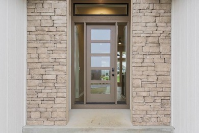 The Woodland by Elevate Design + Build is a reverse 1.5-story 5 on Heritage Park Golf Course in Kansas - for sale on GolfHomes.com, golf home, golf lot