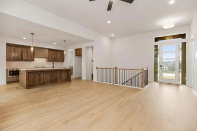 The Woodland by Elevate Design + Build is a reverse 1.5-story 5 on Heritage Park Golf Course in Kansas - for sale on GolfHomes.com, golf home, golf lot