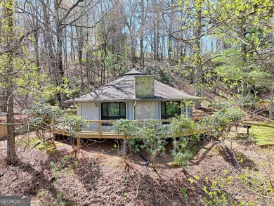 Escape to your own private mountain retreat in beautiful Sky on Sky Valley Resort and Country Club in Georgia - for sale on GolfHomes.com, golf home, golf lot