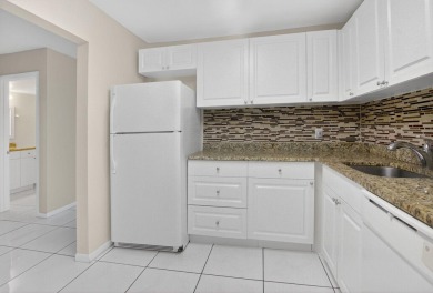 Stunning 2-Bed, 2-Bath Condo in a Gated Community with on Boca Lago Golf and Country Club in Florida - for sale on GolfHomes.com, golf home, golf lot