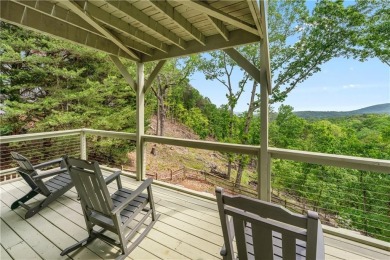 This stunning home offers privacy and views of Lake Arrowhead on The Highlands Course at Lake Arrowhead in Georgia - for sale on GolfHomes.com, golf home, golf lot