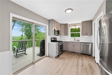 This stunning home offers privacy and views of Lake Arrowhead on The Highlands Course at Lake Arrowhead in Georgia - for sale on GolfHomes.com, golf home, golf lot