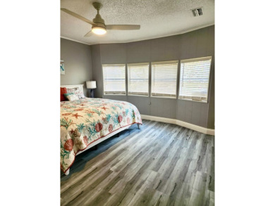 If you've been searching for a beautifully updated home in sunny on Lake Fairways Country Club in Florida - for sale on GolfHomes.com, golf home, golf lot