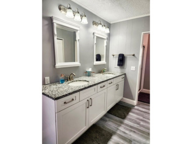 If you've been searching for a beautifully updated home in sunny on Lake Fairways Country Club in Florida - for sale on GolfHomes.com, golf home, golf lot