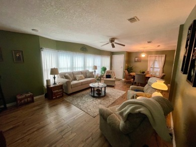 Check this out!! This home has been meticulously kept with on Water Oak Country Club Estates in Florida - for sale on GolfHomes.com, golf home, golf lot