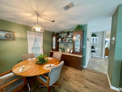 Check this out!! This home has been meticulously kept with on Water Oak Country Club Estates in Florida - for sale on GolfHomes.com, golf home, golf lot