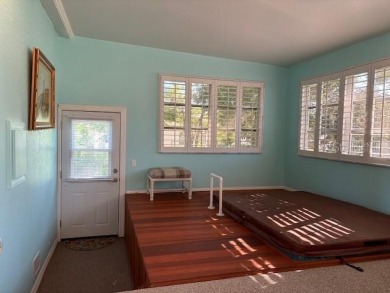 Come and take a look at this large triple-wide manufactured home on Country Club of Mount Dora in Florida - for sale on GolfHomes.com, golf home, golf lot