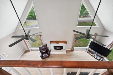 This stunning home offers privacy and views of Lake Arrowhead on The Highlands Course at Lake Arrowhead in Georgia - for sale on GolfHomes.com, golf home, golf lot