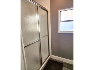 If you've been searching for a beautifully updated home in sunny on Lake Fairways Country Club in Florida - for sale on GolfHomes.com, golf home, golf lot