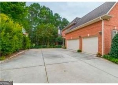 INSTANT EQUITY! Here lies a rare breed of comfort and elegance on The Governors Towne Club in Georgia - for sale on GolfHomes.com, golf home, golf lot
